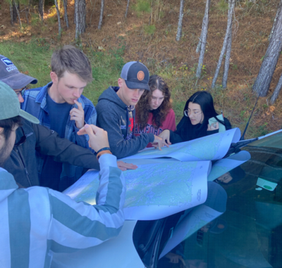 Geography Students Study Topographic Maps