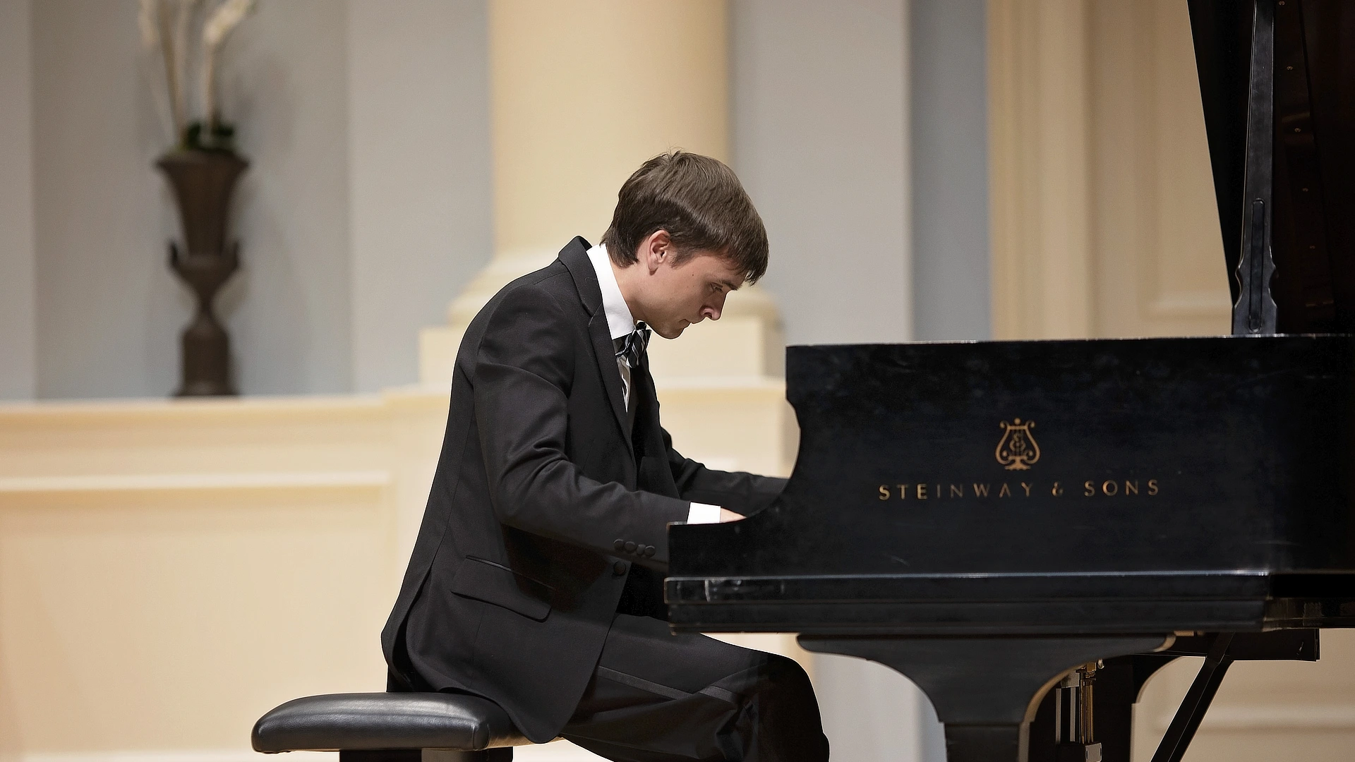 male student playing the piano DR04182023227