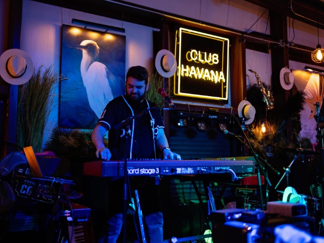 Briggs Cooper playing keyboard at the Havana Club