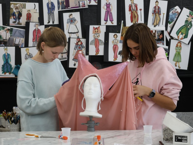 Students create costumes for Alice by Heart