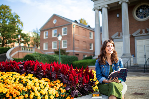 female divinity student with flowers