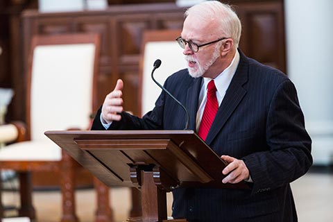 Timothy George at lectern