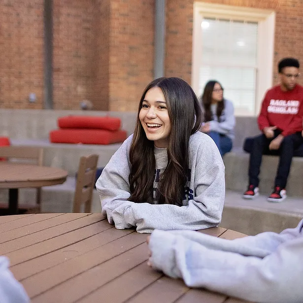 female student at a table