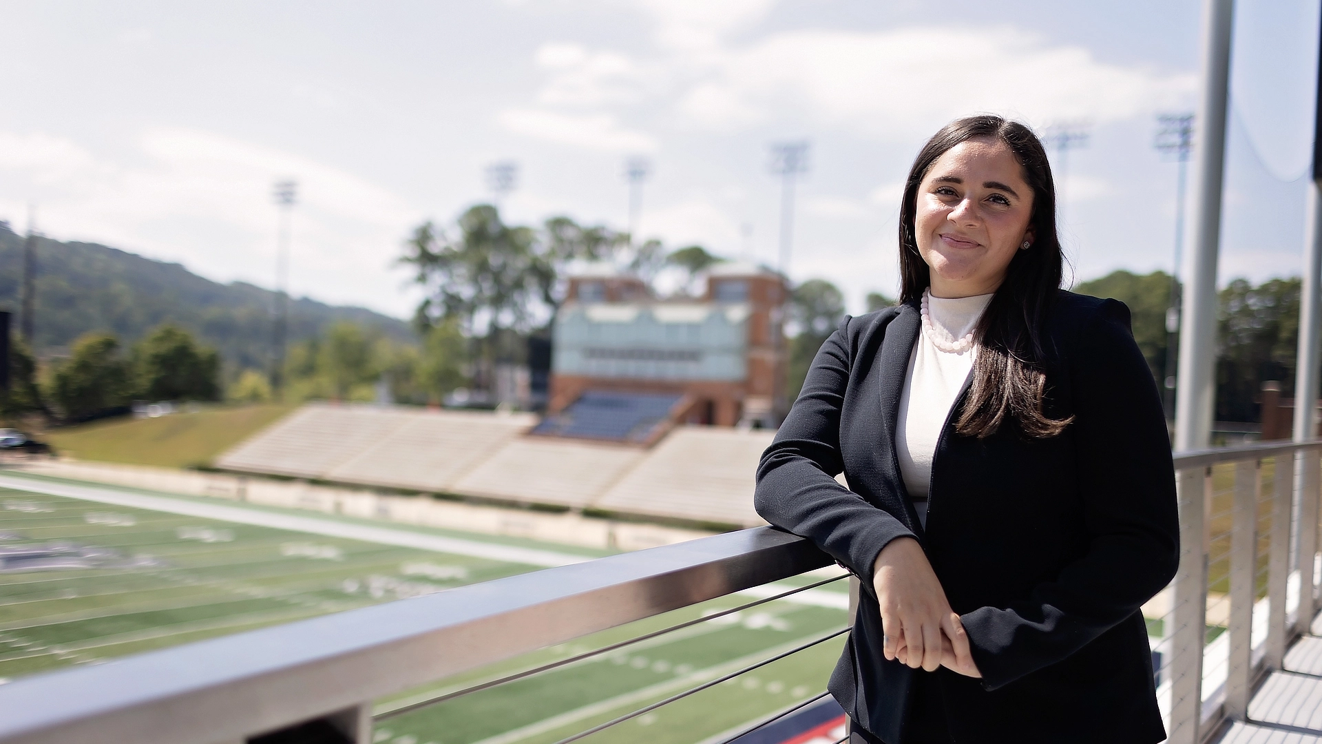 Female Student at Football Field