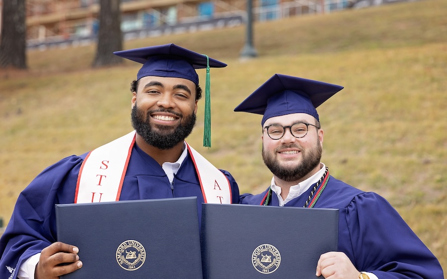 Samford graduates with diplomas