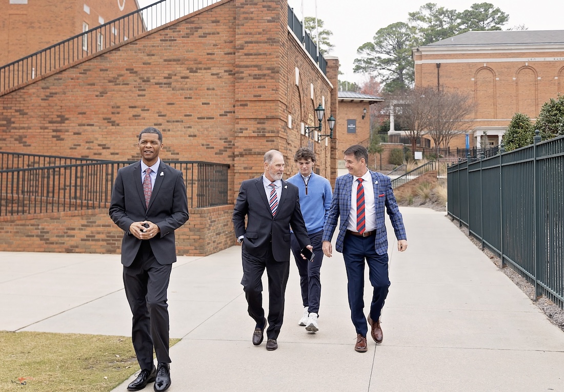 John Grass Walks Campus With Martin Newton
