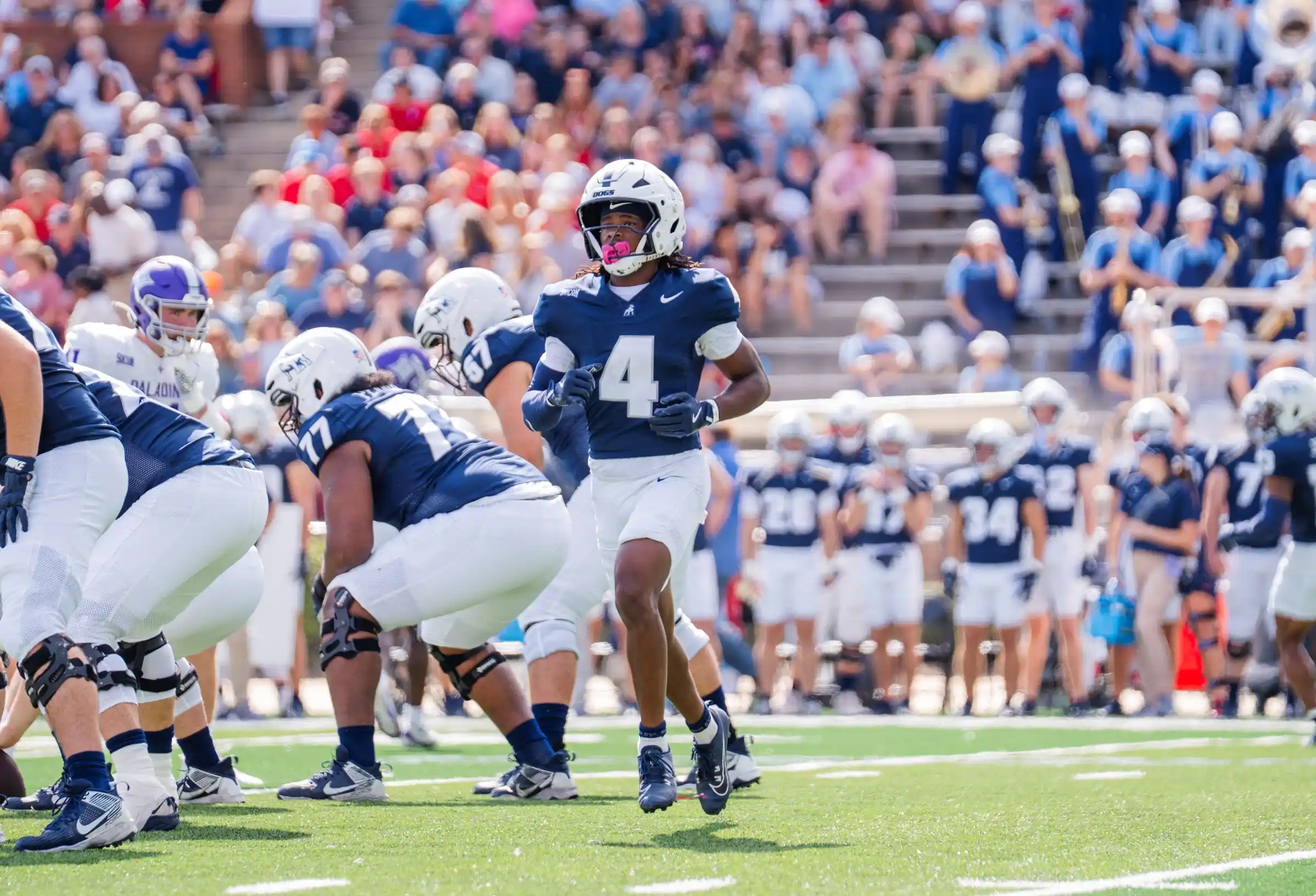 Football player in front of crowd