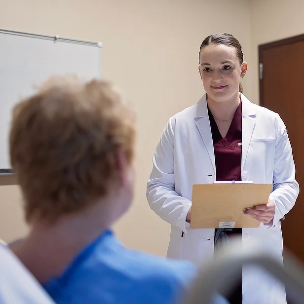 Student with Patient