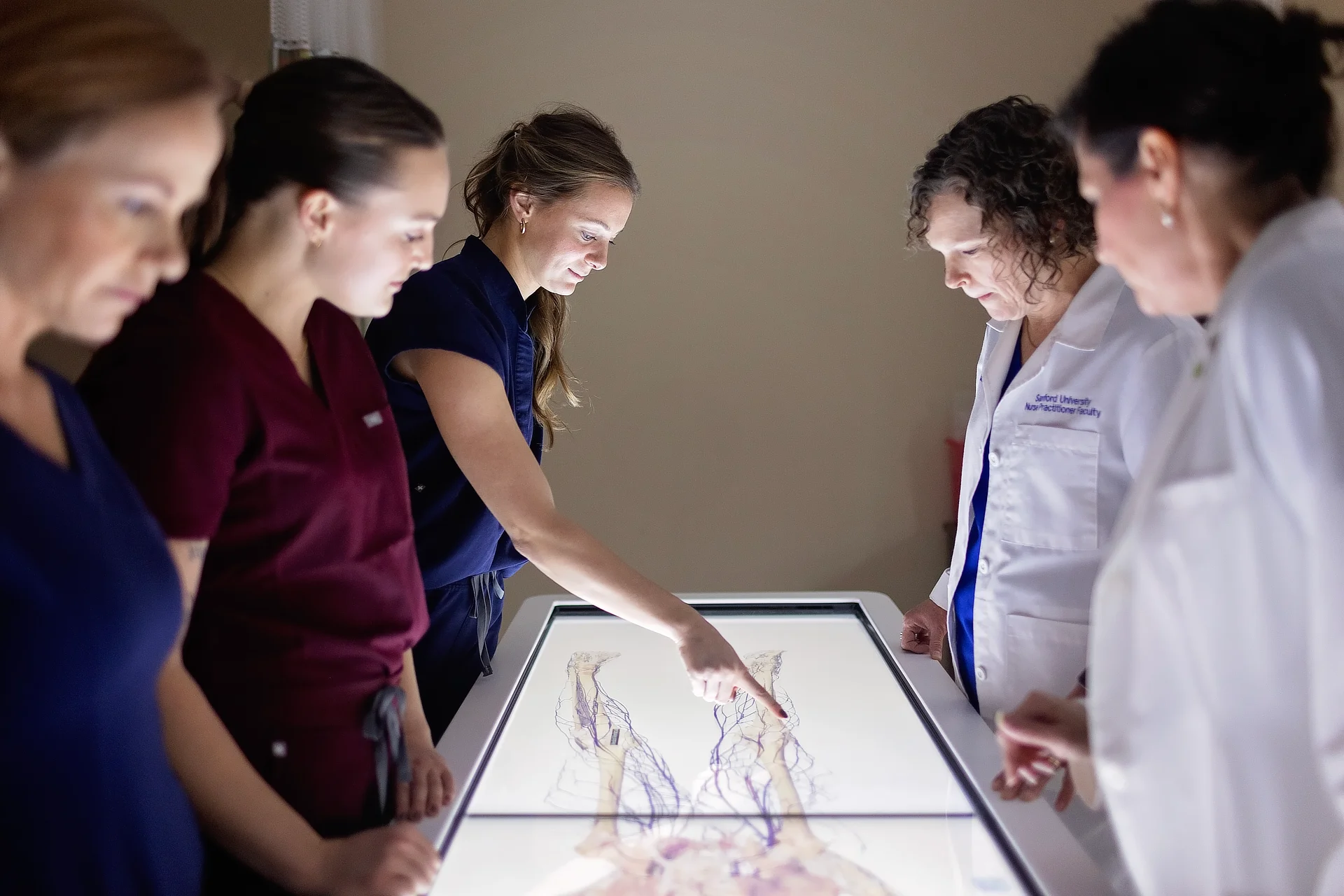 Students Around Anatomage Table DR11172023615