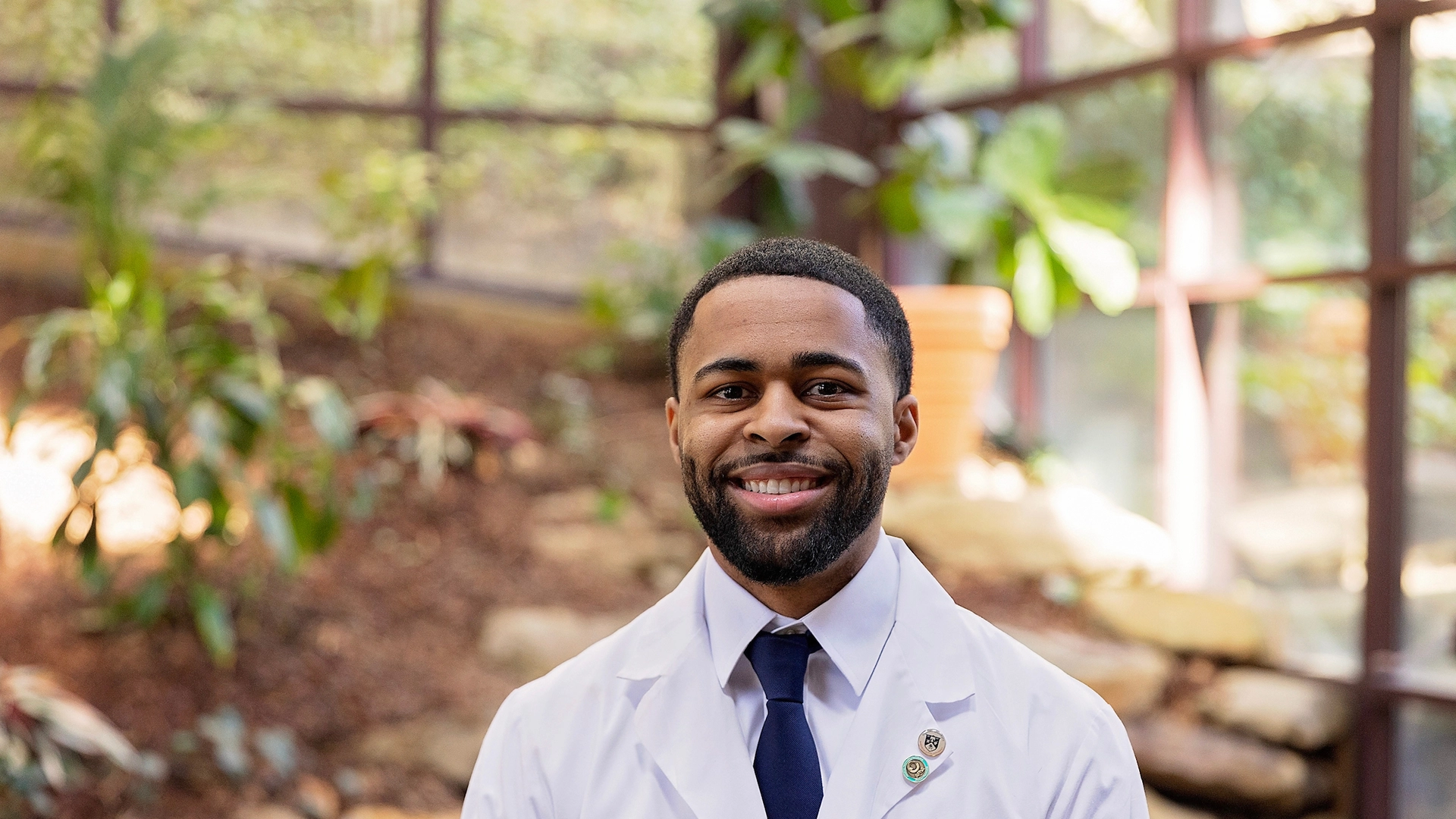male pharmacy student atrium