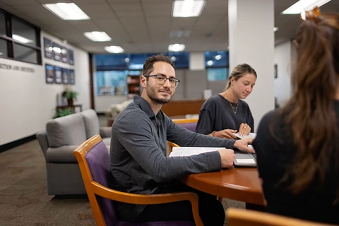 students at a table