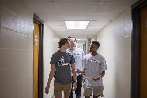 three male students on move in day DR08252022511