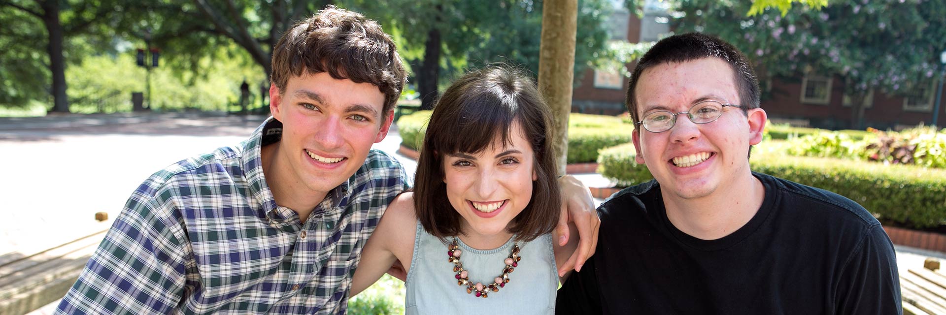 fellows students smile on the quad