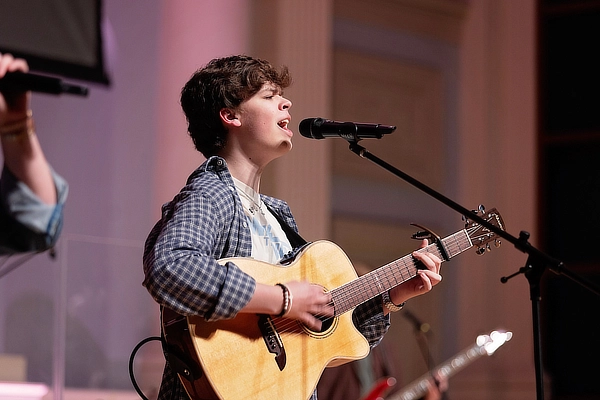 Worship Student Playing Guitar