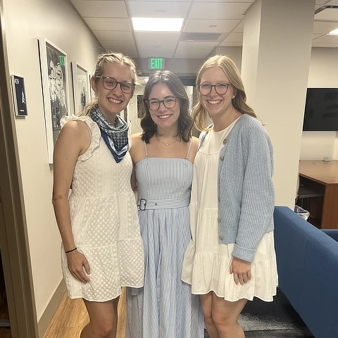 three girls standing together