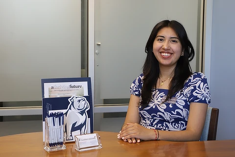 female counselor sitting at a table