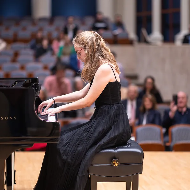 Female Student Playing Piano