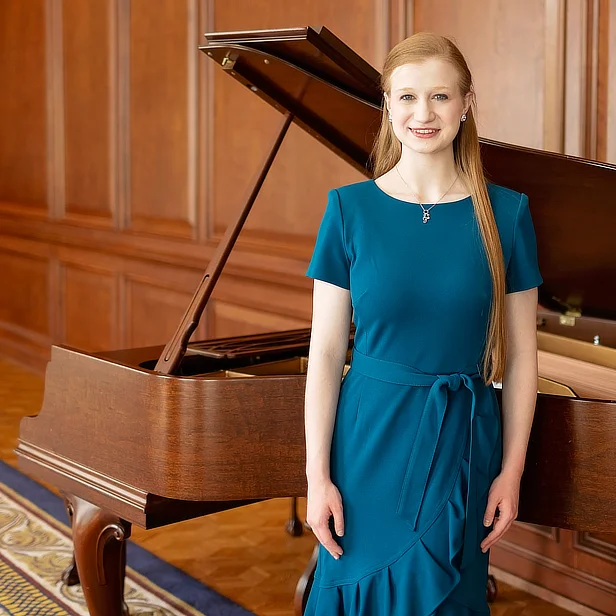 Female Student in Recital Hall