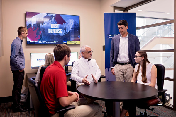 Darin White with students