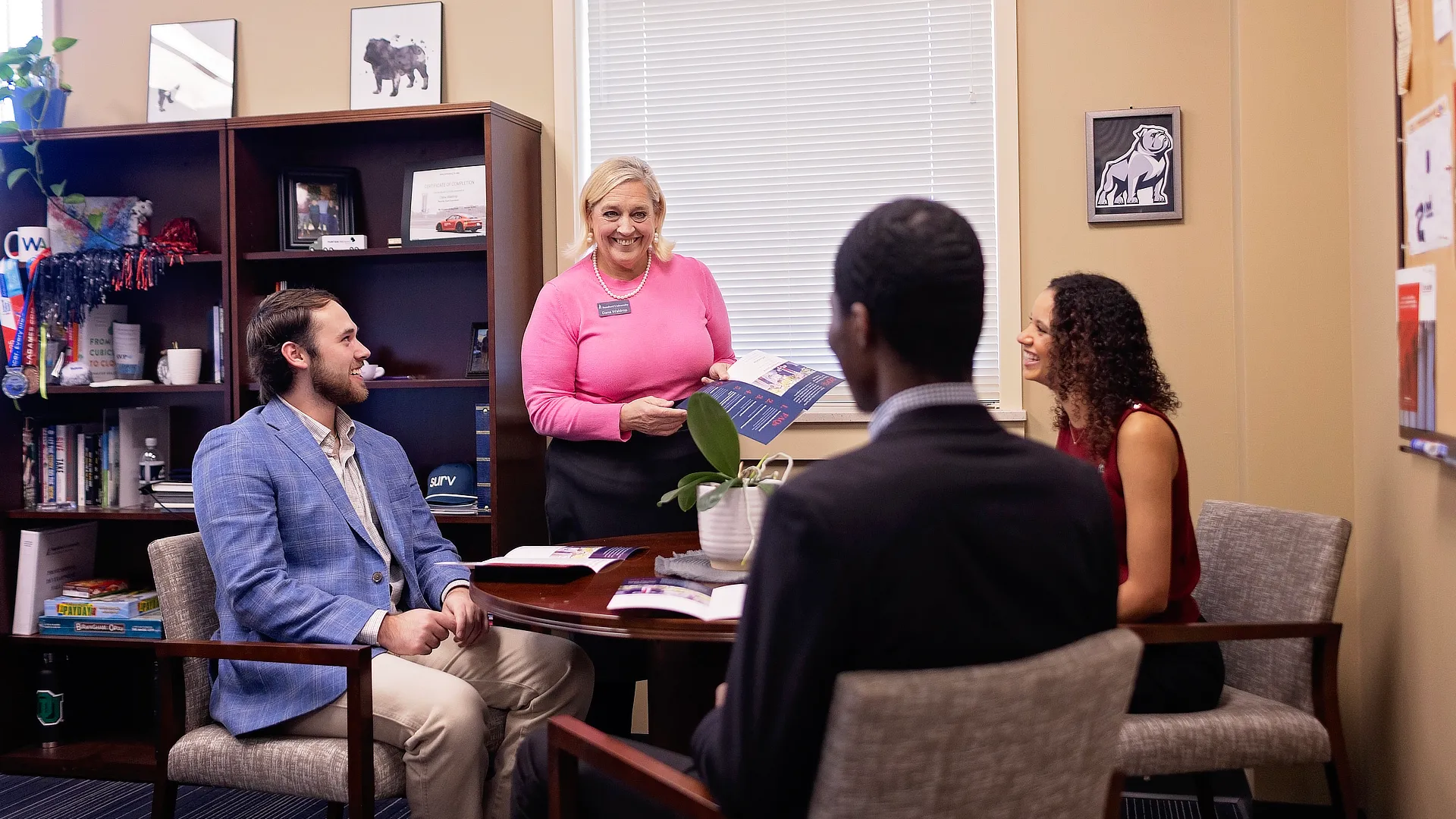 adviser with a group of students