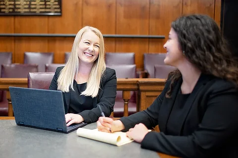 two female law students in the courtroom