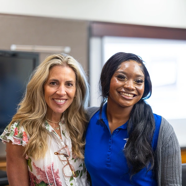 two women smiling