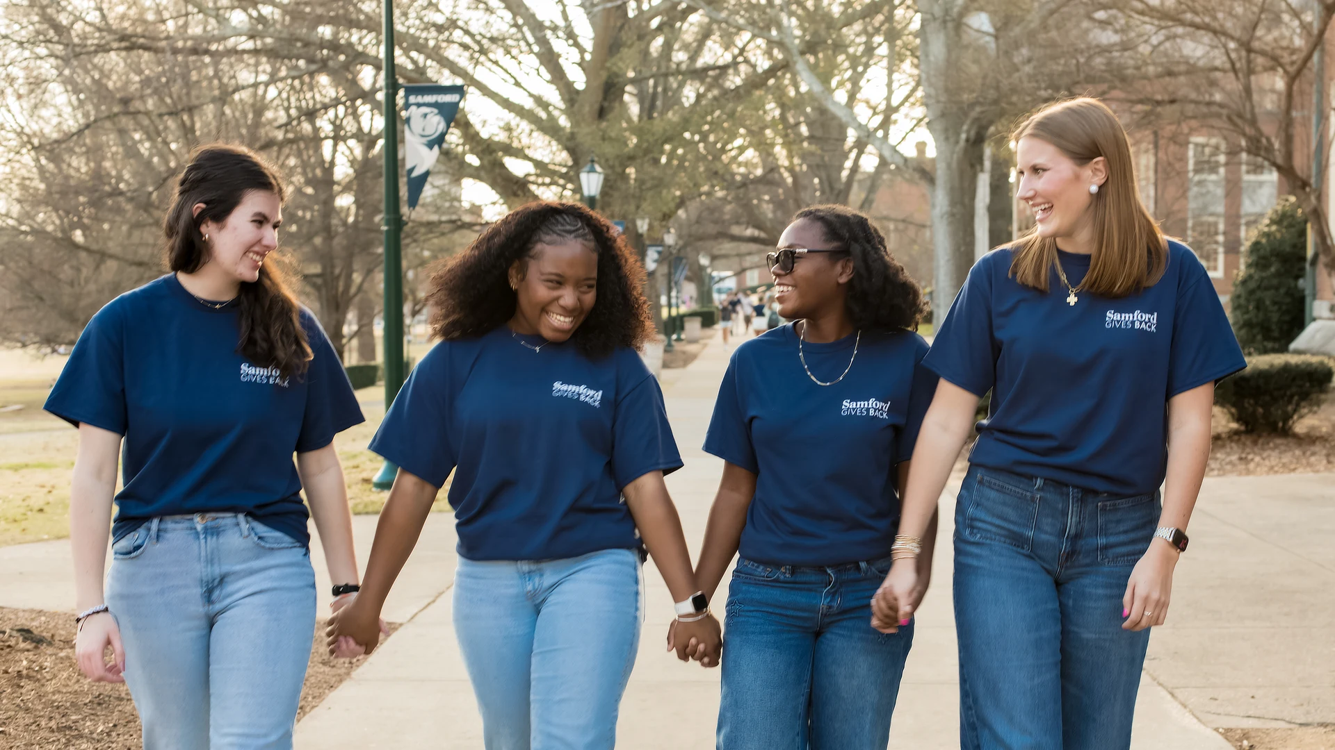female students walking together