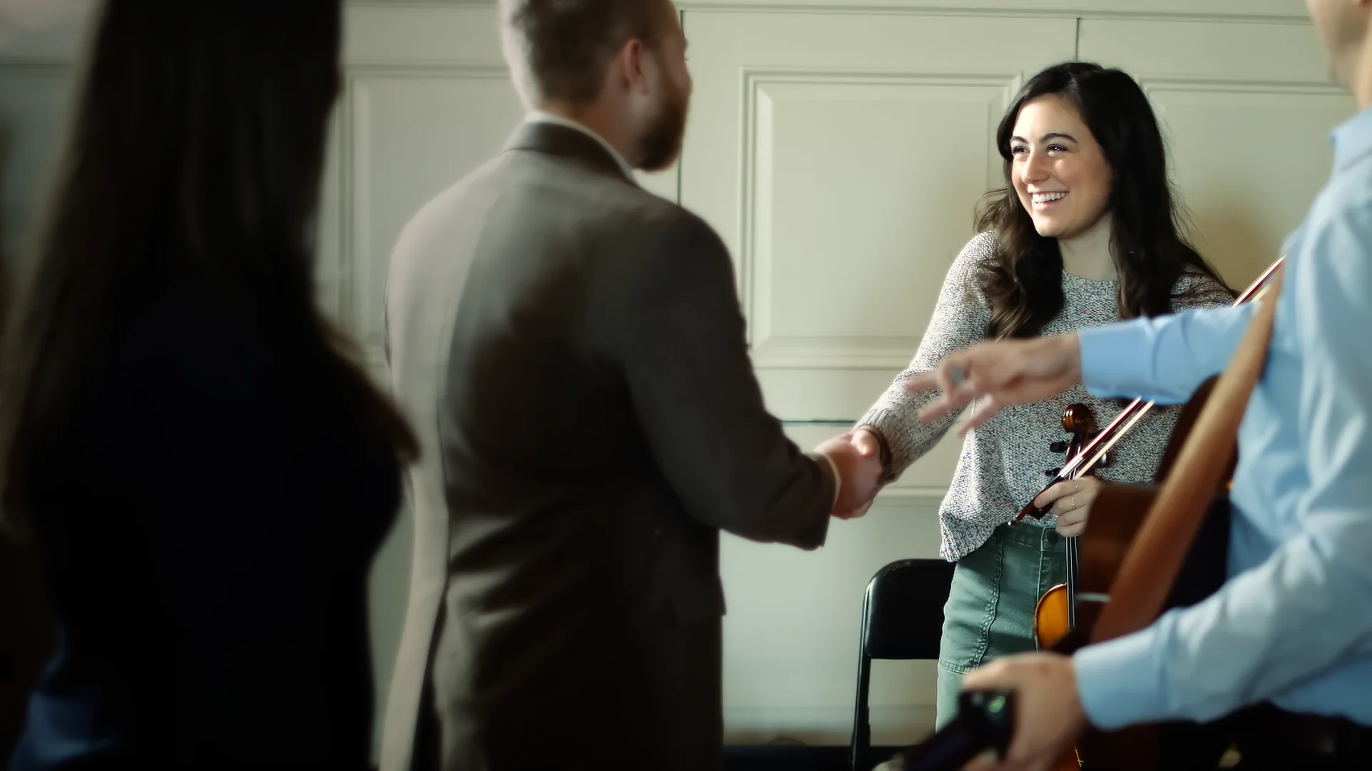 Student Shaking Ministers Hand